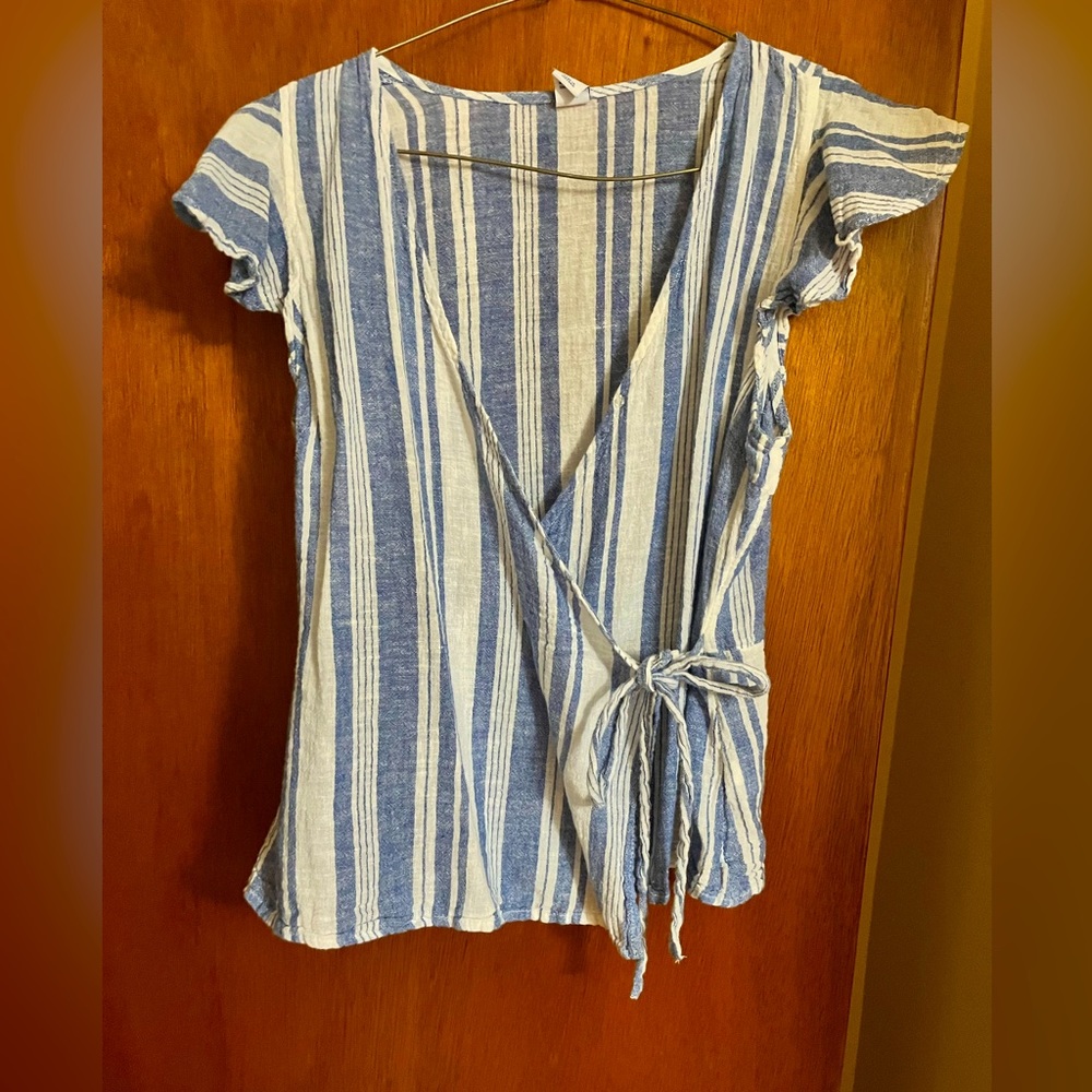 Cute gauze wrap top that will. make your figure look great!